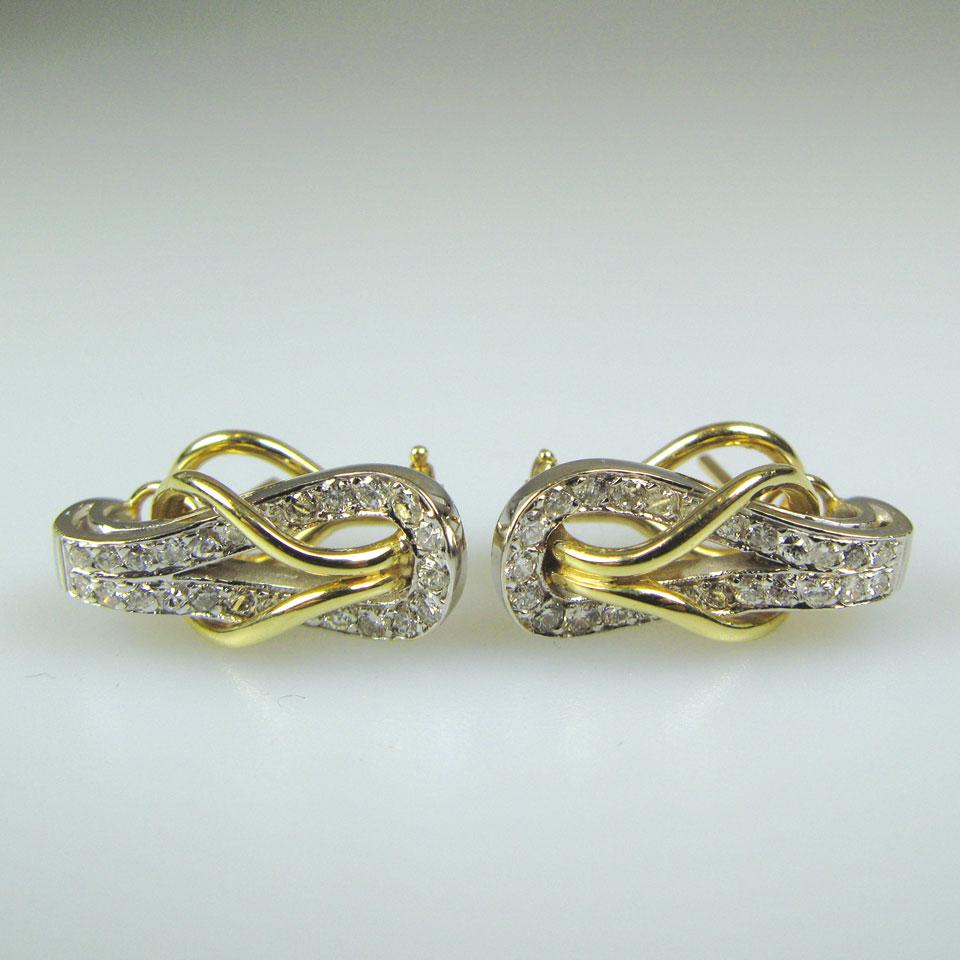 Pair of 14k yellow and white gold clip and stud back earrings