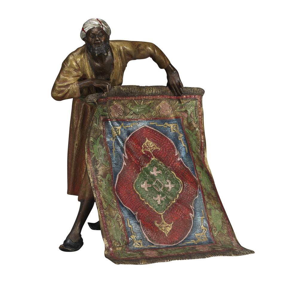 Franz Bergman (Austrian, 1861-1936) Cold Painted Bronze Figure of a Bedouin Carpet Seller, early 20th century