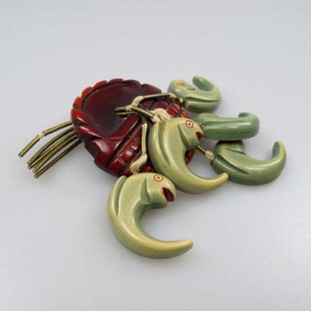 Carved And Over Dyed Red And Green Bakelite Brooch